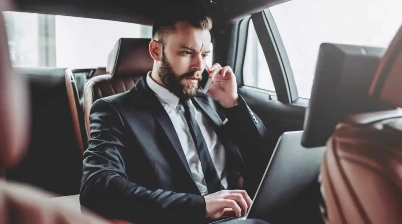 Executive corporate limo service in Toronto for business travel with professional chauffeur and luxury vehicle